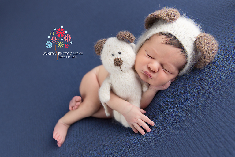Newborn Photography Red Bank NJ - So there is special significance to this photo - The family has a cute puppy but could not bring him to the studio - so while a lovie cannot never compare to a real puppy the family wanted this as a momento
