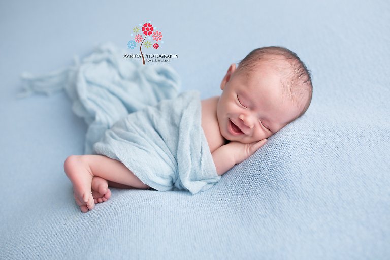 Newborn Photography Milford NJ - Look there is that smile again and my favorite color blue - looks soft and heavenly doesn't it