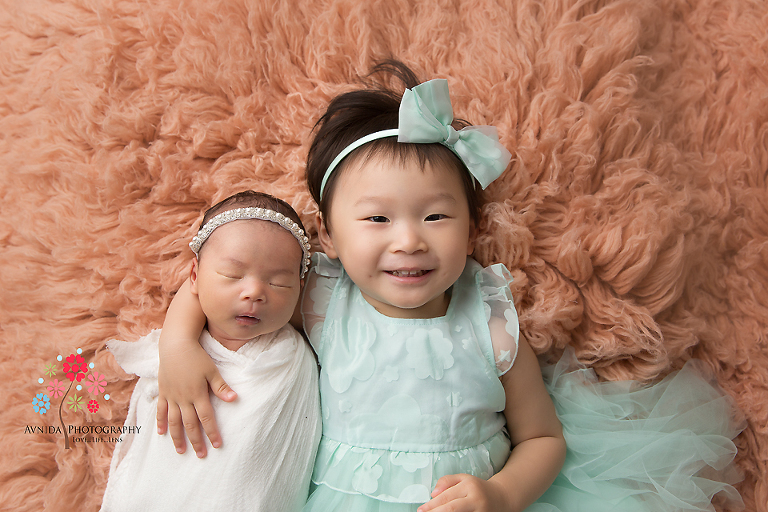 Newborn Photography Flemington NJ - Sisters typically make the best friends and it seems it won't be any different either in this family