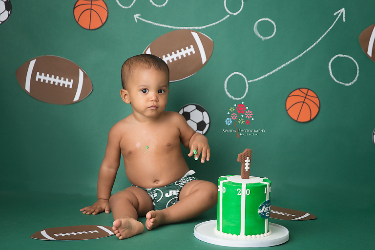 Cake Smash Photography Alpine NJ - it's the first touchdown - even with that little cake we have a reason to celebrate