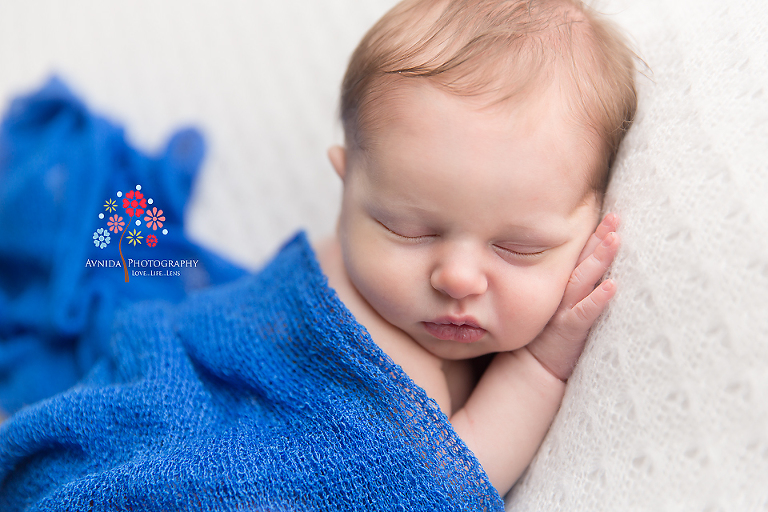 Newborn Photography Millington NJ - Baby Roberts' perfect skin complexion combined with the absolutely brilliant blue makes this picture a 10