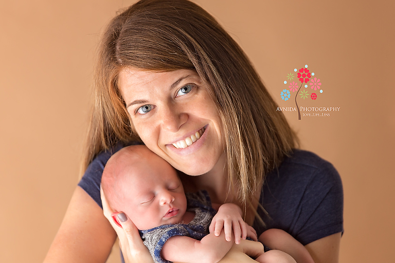 Basking Ridge Newborn Photography NJ - That smile just shows the deep affection and love that mom has for her little one - this little kid is going to be mama's boy