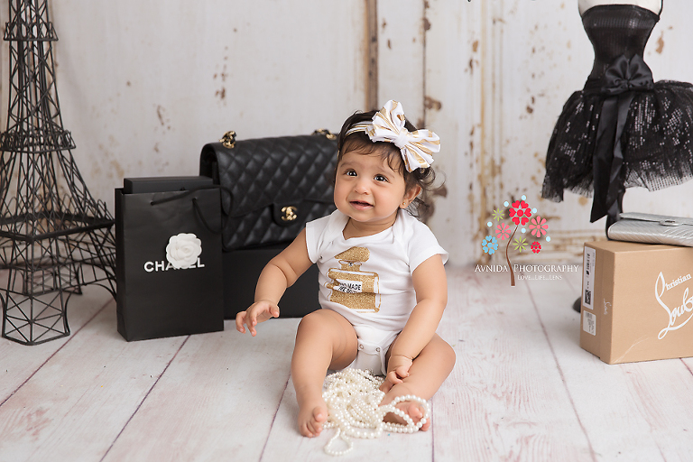 Cake Smash Photography Saddle River NJ - Baby Ahayli has just landed in beautiful Paris, and seems a little overwhelmed with the shopping choices - so many things to do and buy