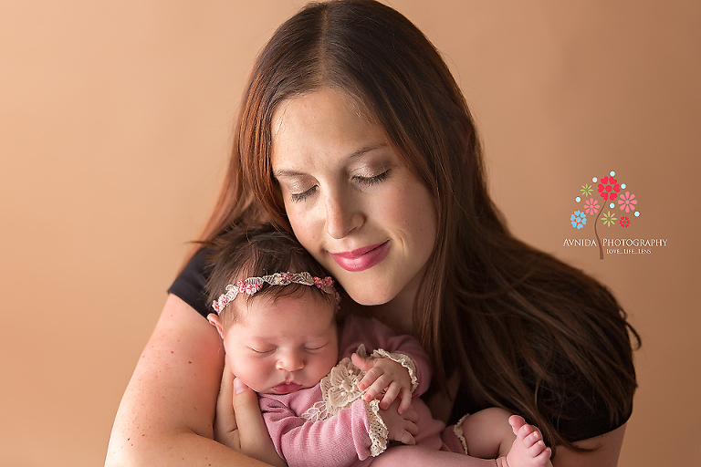 Newborn Photography Spring Lake NJ - Like mom, like daughter, two peas in a pod, just hugging each other in affectionate love