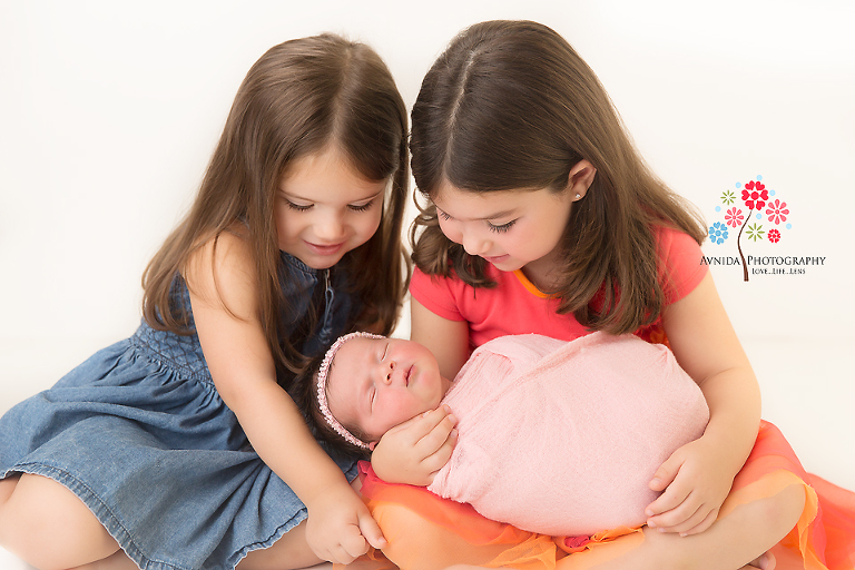 Newborn Photography Spring Lake NJ - the love between siblings cannot be expressed in words, and this photograph is clear proof of that love