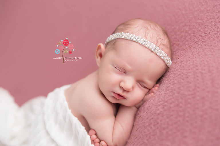 Newborn Photography Rumson NJ - A close up of the photograph in white - can you tell that Skylar was a good sleeper during newborn session