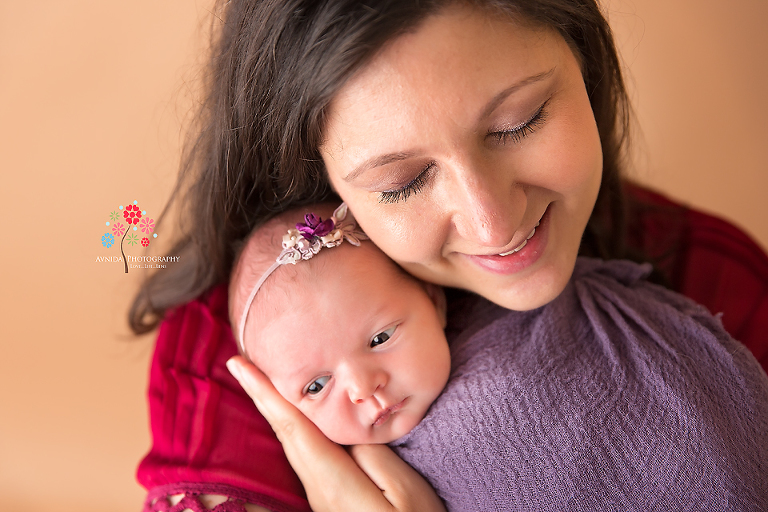 Newborn Photography Rumson NJ - Ah, the love of a mom for her little one, especially one with such beautiful eyes and cute cheeks