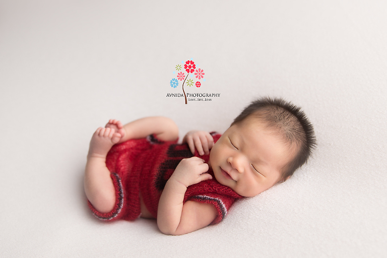 Newborn Photography Franklin Lakes NJ - The color of love, and this little casanova just shines in it