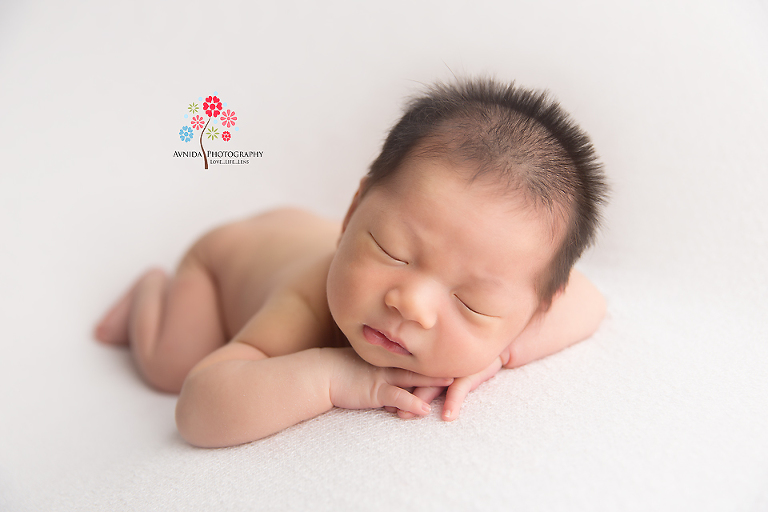 Newborn Photography Franklin Lakes NJ - Those spiky hair are killing me, more noticeable with the white blanket, aren't they