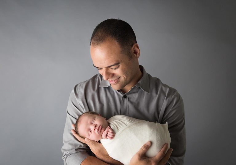 how can a father not dote over his little newborn baby, by NJ's celebrity baby photographer