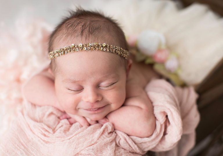the little smiling newborn baby beauty - by NJ's best newborn photographer
