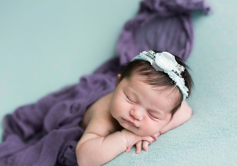 Tips for choosing the best color combinations for newborn photography. Visit us at www.avnidaphotography.com for more tips.