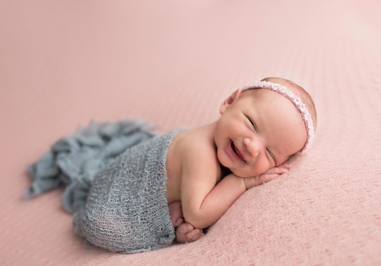 The smile on this newborn baby just made my day