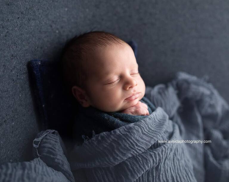 Best Newborn Photographer NJ - baby in dark grey color blanket