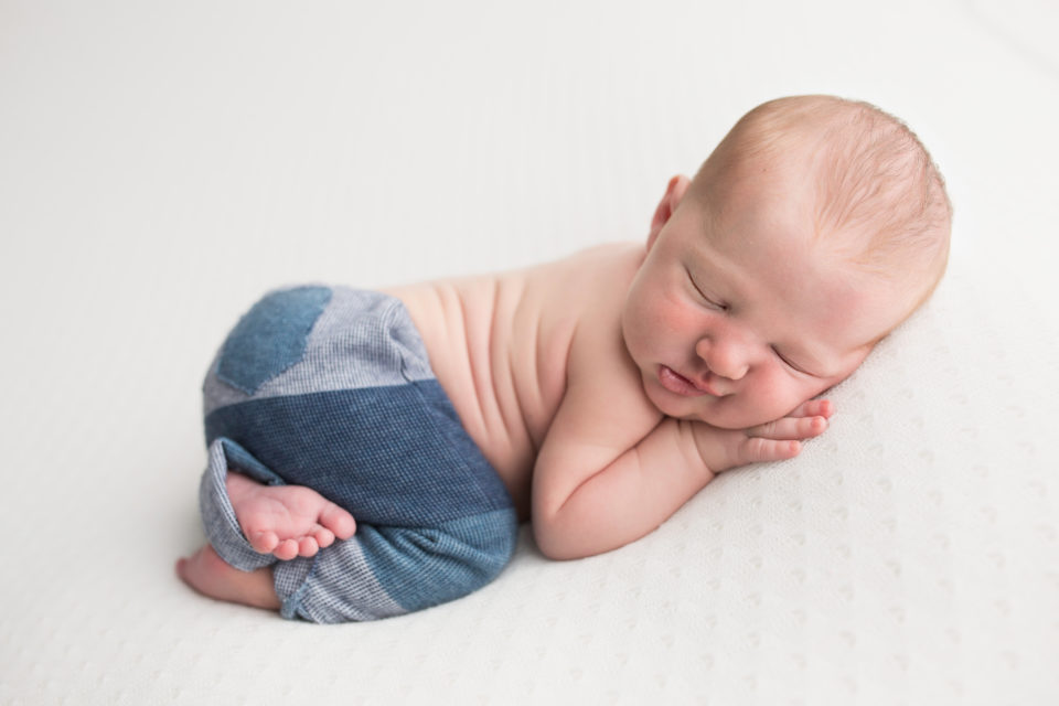 Newborn Photographer Chatham NJ - he wears the pants, literally he does