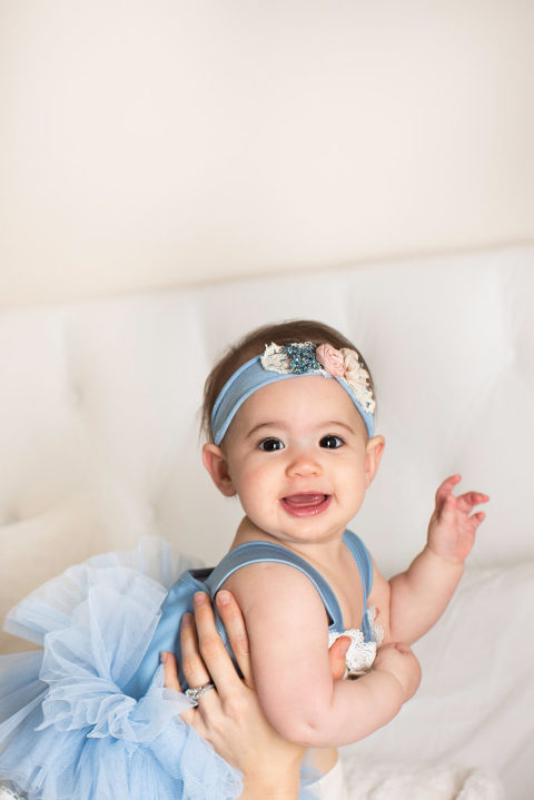 Beautiful Baby Boy 6 month old poses in his diaper on white Stock Photo -  Alamy