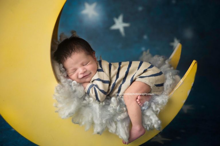 Newborn Photographer Northern NJ - Enjoying his time on the moon, the smile says it all