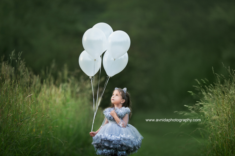 Children's Couture Photography - Wondering what journey the balloons will take her next to?