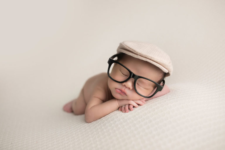 Newborn Photography Westfield NJ session by Avnida Photography. Mr Smart. and Handsome, he's got it all.