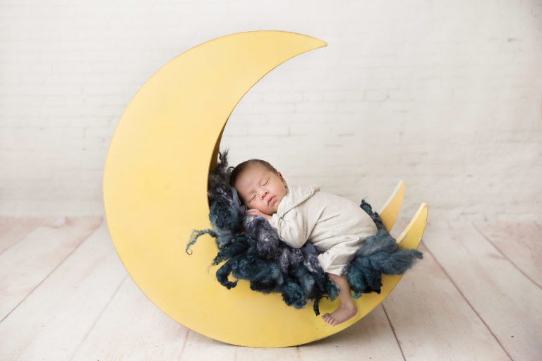 Newborn Photography Westfield NJ session by Avnida Photography. The moon is made of cheese - the digging gets you sleepy.