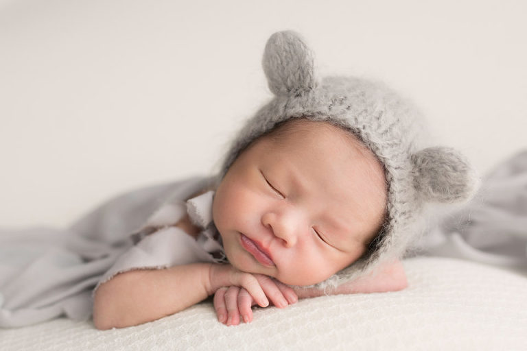 Newborn Photography Westfield NJ session by Avnida Photography. The cute bunny ears and that perfect sleep - the perfect combination for a newborn.