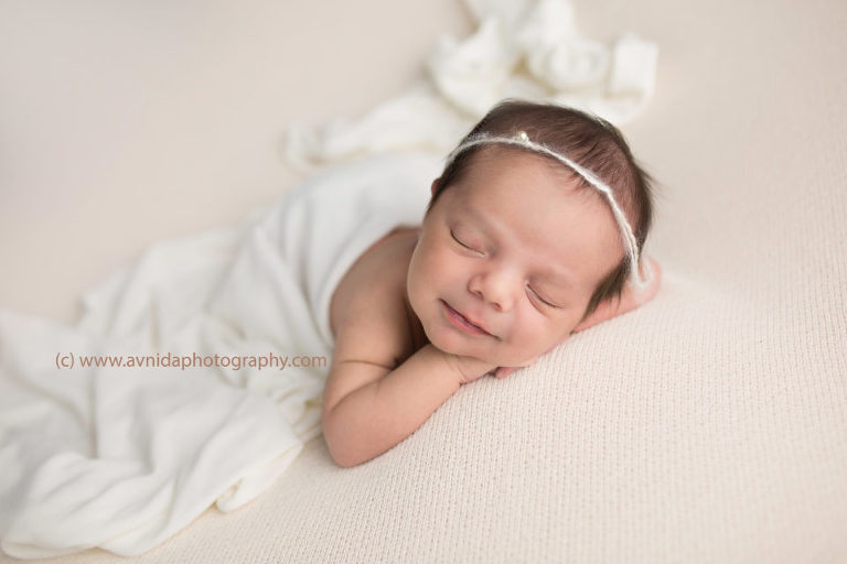 Newborn Photography Gladstone NJ - White! The color of serenity, love and calmness. And a smile to it makes it even better!