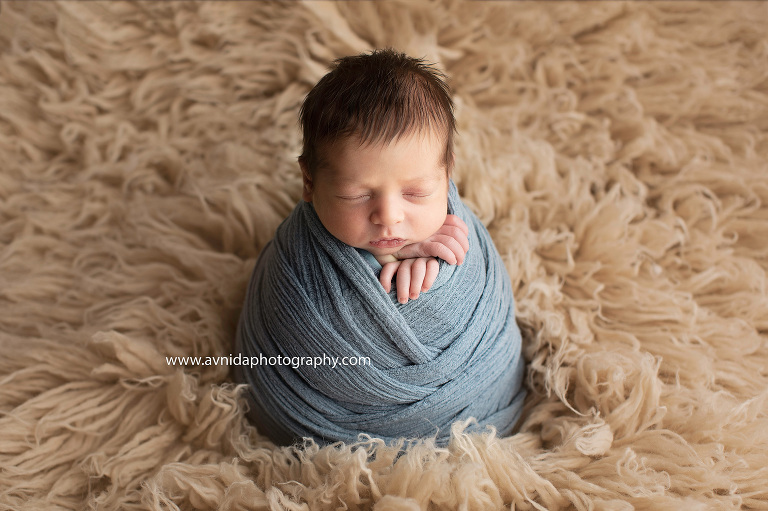 What do we celebrate newborn photography? Because we get to photograph little cute bundles of joy, that make us smile.