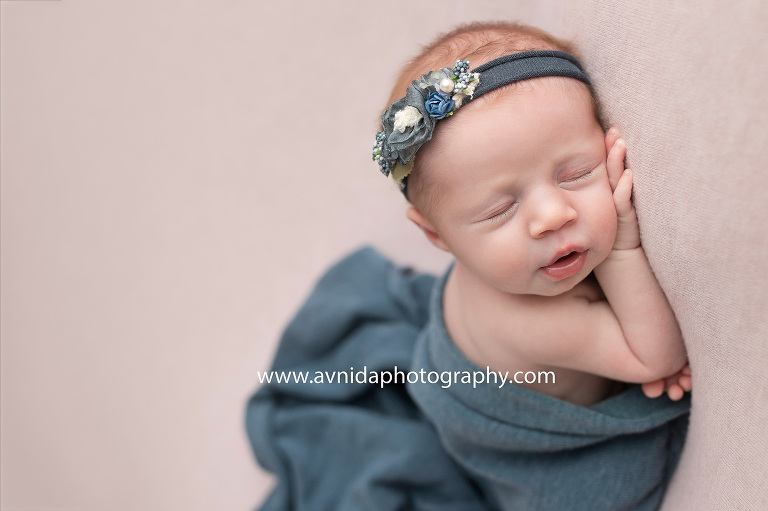 Whoever said that accessories do not matter for newborn photography session hasn't seen a princess in matching headband and wrap. Baby Mackenzie looks so beautiful.