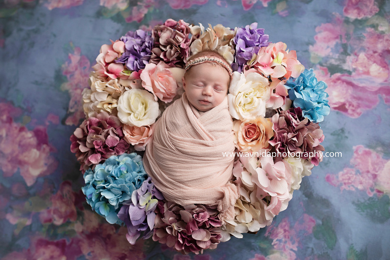 There is a deeper meaning to this photo from the Newborn Photographer Randolph NJ session. Kids add color to our life. We ad color to their photo shoot :)