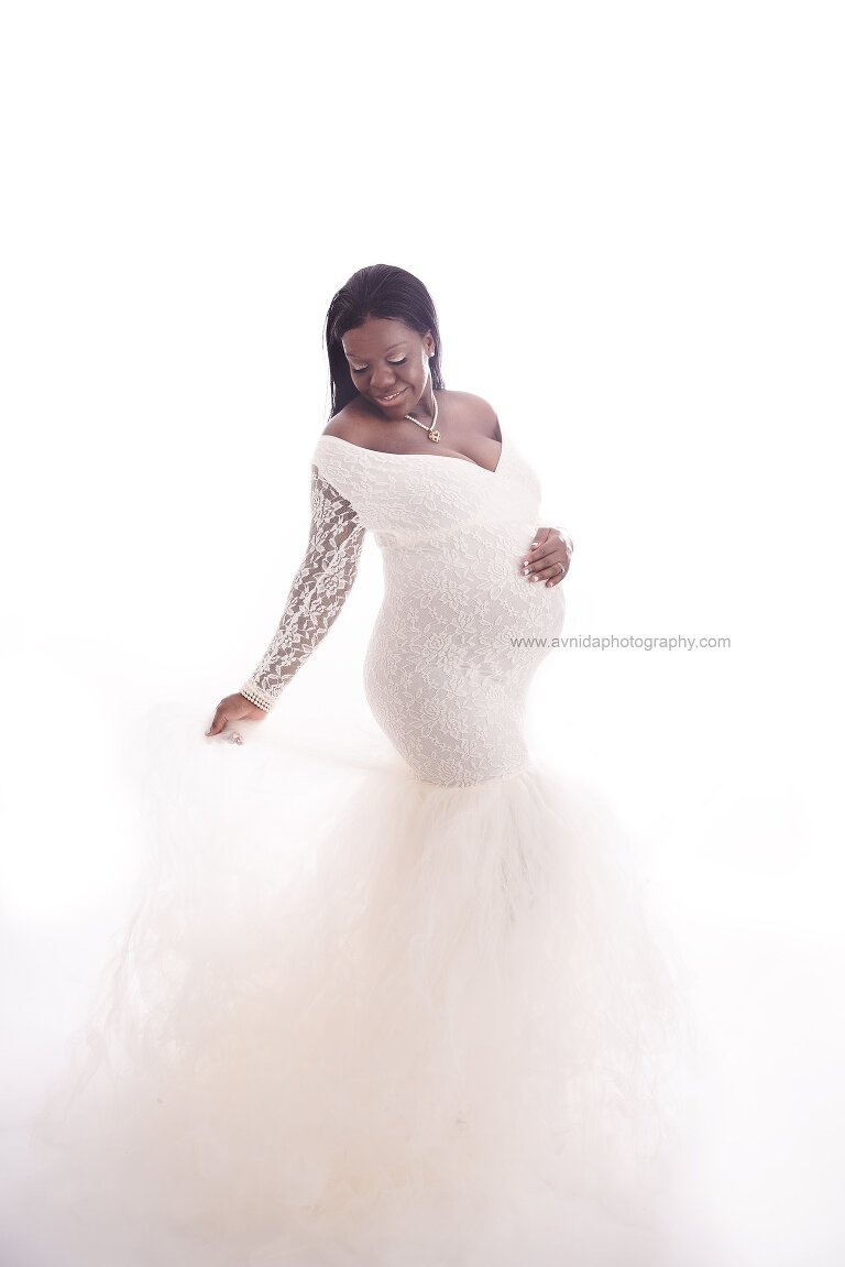 Maternity Photography Gowns - white lace and tutu and an amazing pose by a beautiful mom-to-be
