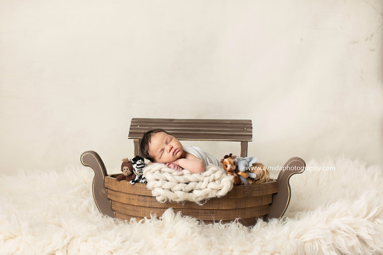 Newborn Photography East Hanover NJ - Baby Daniels has been charting Noah's ark to lead all the animals to safety - finally he is tired and taking a break