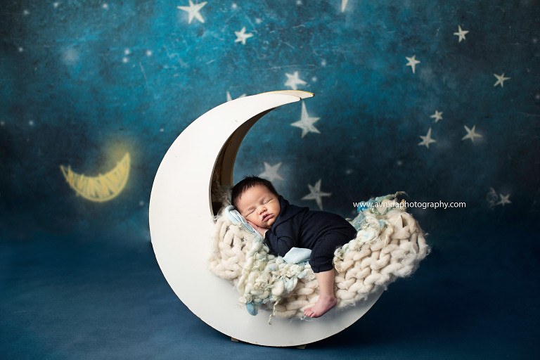 Newborn Photography East Hanover NJ - after taking a long journey to the moon, Baby Daniels decides to take a break
