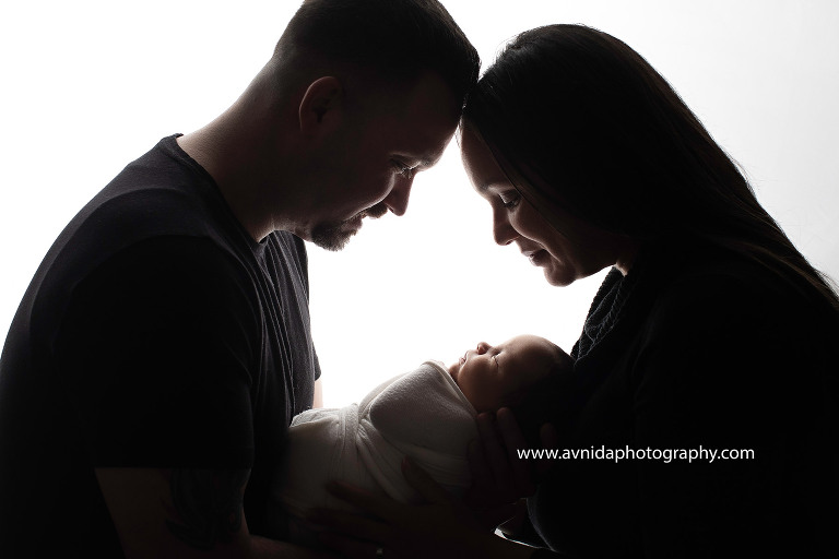 Newborn Photography East Hanover NJ - beautiful silhouette of the parents and baby daniel