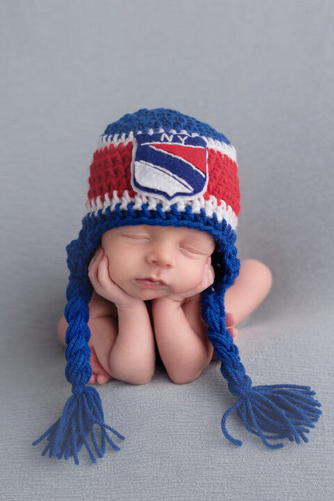 Newborn Photography South Jersey NJ - The hockey game just ended and this fan is sad