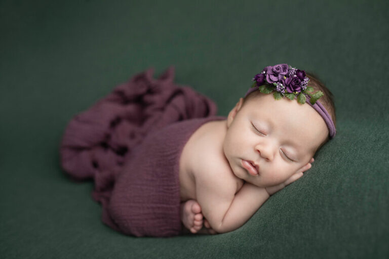 Newborn Photography Lakewood Township NJ - the combination of green and purple just pops for this little one